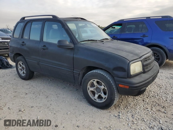 2000 Chevrolet Tracker z VIN 2CNBE13C4Y6920783, wystawiony jako Copart lot #82619854 z przebiegiem 96 620 mil mil oraz Czysty tytuł • Clean title. Historia ofert i sprzedaży dostępna na DreamBid. Obrazek 4.
