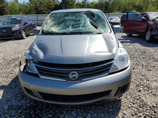 2011 Nissan Versa S z VIN 3N1BC1CP5BL516779, wystawiony jako Copart lot #52226775 z przebiegiem 176 384 mil mil oraz Tytuł czysty. Historia ofert i sprzedaży dostępna na DreamBid. Obrazek 5.