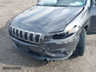 2019 Jeep Cherokee Latitude Plus with VIN 1C4PJMLB2KD317256, listed as a IAAI auction lot 41723541 with 61,322 mi miles. Bid and sale history available at carsss.com. Image 6.