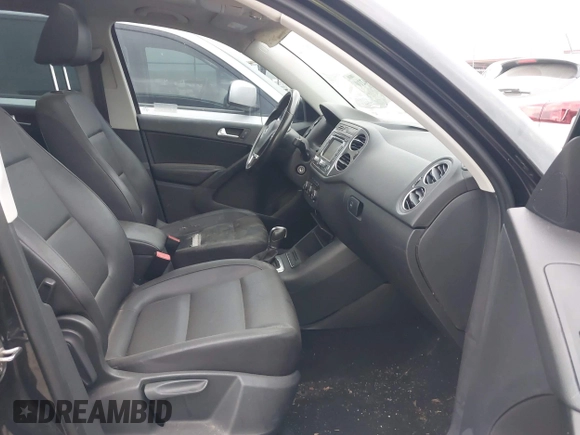 2012 Volkswagen Tiguan SE with VIN WVGAV7AX9CW611202, listed as a IAAI auction lot 41944210 with 118,002 mi miles and . Bid and sale history available at DreamBid. Image 5.