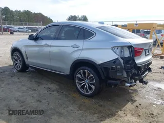2019 BMW X6 xDrive35i with VIN 5UXKU2C52K0Z63984, listed as a IAAI auction lot 41612265 with 65,634 mi miles. Bid and sale history available at carsss.com. Image 3.