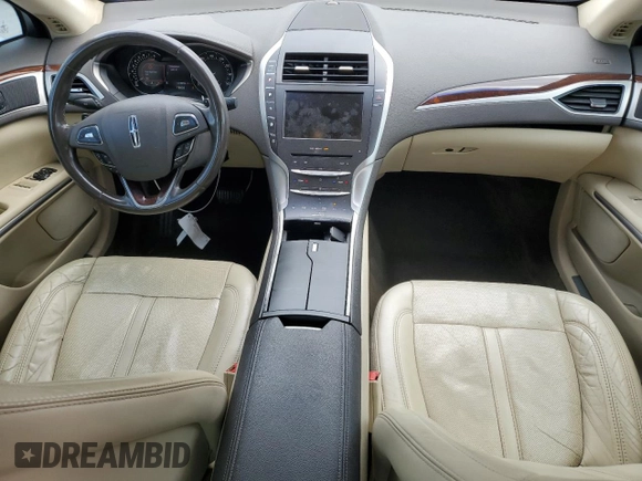2015 Lincoln MKZ z VIN 3LN6L2J90FR601908, wystawiony jako Copart lot #55516355 z przebiegiem 127 487 mil mil oraz Szkoda całkowita • Salvage title. Historia ofert i sprzedaży dostępna na DreamBid. Obrazek 8.