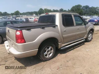 2004 Ford Explorer Sport Trac XLS z VIN 1FMZU77K14UB03658, wystawiony jako IAAI lot #42423244 z przebiegiem Nie podano mil oraz . Historia ofert i sprzedaży dostępna na DreamBid. Obrazek 4.