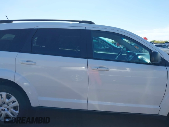 2016 Dodge Journey American Value with VIN 3C4PDCAB2GT230608, listed as a IAAI auction lot 42191801 with 115,477 mi miles and . Bid and sale history available at DreamBid. Image 14.