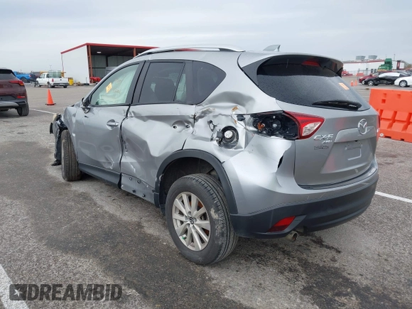 2014 Mazda CX-5 Touring with VIN JM3KE4CY1E0426409, listed as a IAAI auction lot 41924258 with 116,956 mi miles. Bid and sale history available at carsss.com. Image 3.