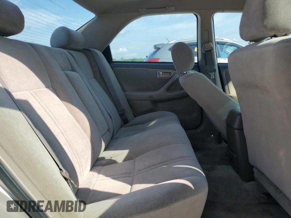 2001 Toyota Camry CE z VIN 4T1BG22KX1U774132, wystawiony jako Copart lot #57632885 z przebiegiem 179 771 mil mil oraz Szkoda całkowita • Salvage title. Historia ofert i sprzedaży dostępna na DreamBid. Obrazek 10.