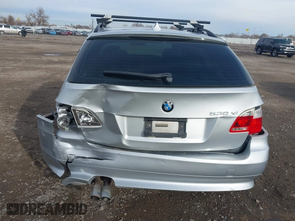 2006 BMW 5 Series 530xi with VIN WBANN73506CN01479, listed as a IAAI auction lot 40933082 with 200,464 mi miles and . Bid and sale history available at carsss.com. Image 6.