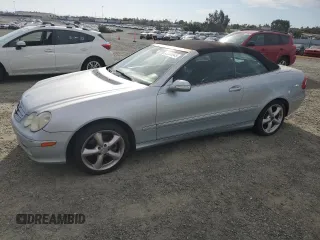 2005 Mercedes-Benz CLK 320 with VIN WDBTK65G65T052026, listed as a Copart auction lot 52526945 with 188,859 mi miles and Salvage Title. Bid and sale history available at DreamBid. Image 1.