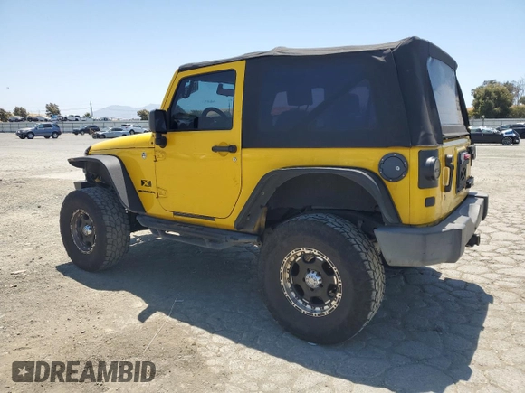 2008 Jeep Wrangler X with VIN 1J4FA24188L567678, listed as a Copart auction lot 60918635 with 185,368 mi miles and Salvage title. Bid and sale history available at DreamBid. Image 2.