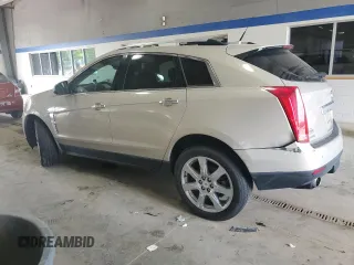 2012 Cadillac SRX Performance Collection with VIN 3GYFNBE31CS518975, listed as a Copart auction lot 51928865 with 152,449 mi miles and Clean Title. Bid and sale history available at carsss.com. Image 2.