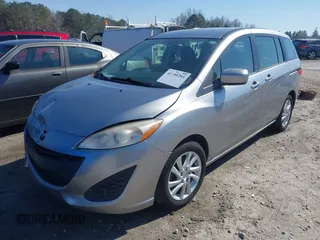 2012 Mazda 5 Sport with VIN JM1CW2BL3C0125660, listed as a IAAI auction lot 41595395 with 163,953 mi miles. Bid and sale history available at carsss.com. Image 2.