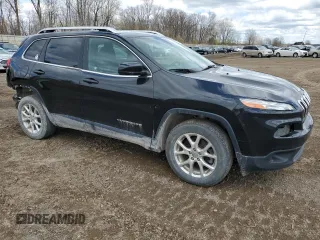 2014 Jeep Cherokee Latitude with VIN 1C4PJMCS3EW124574, listed as a Copart auction lot 53657635 with 164,572 mi miles and Clean Title. Bid and sale history available at carsss.com. Image 4.