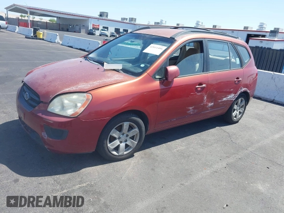 2008 Kia Rondo EX with VIN KNAFG525387174835, listed as a IAAI auction lot 42011406 with 138,656 mi miles. Bid and sale history available at carsss.com. Image 2.