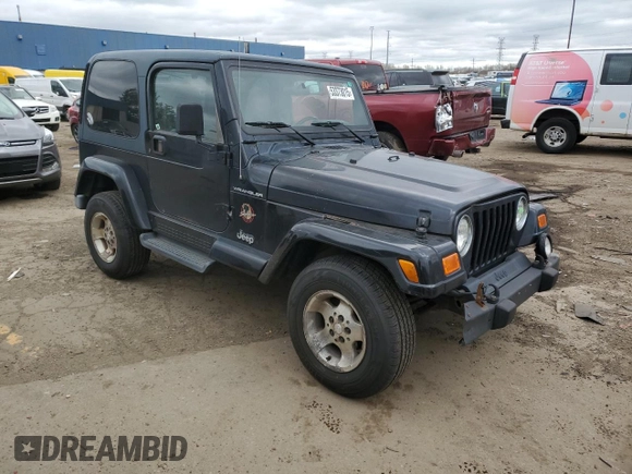 2002 Jeep Wrangler Sahara z VIN 1J4FA59S42P776905, wystawiony jako Copart lot #53373015 z przebiegiem 231 915 mil mil oraz Czysty tytuł • Clean title. Historia ofert i sprzedaży dostępna na DreamBid. Obrazek 4.