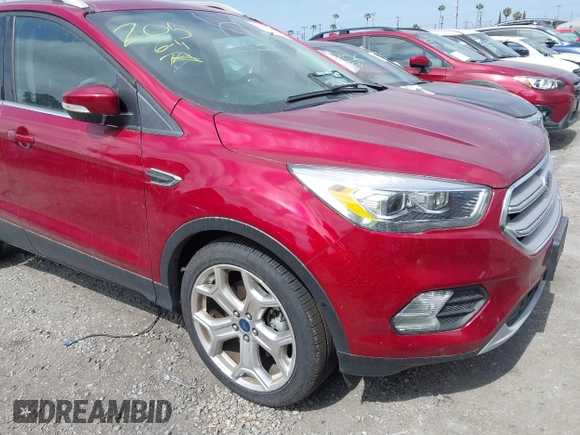2019 Ford Escape Titanium with VIN 1FMCU0J96KUB79330, listed as a IAAI auction lot 42018346 with 35,500 mi miles and . Bid and sale history available at DreamBid. Image 1.
