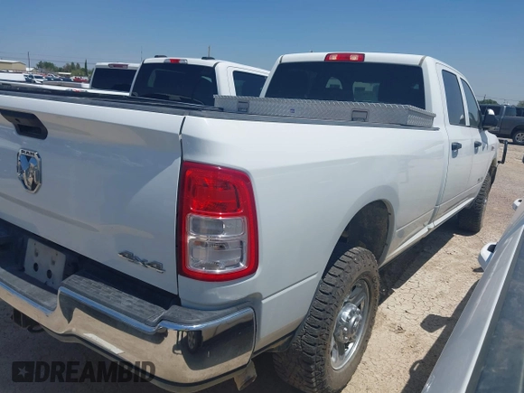 2022 Ram 2500 Tradesman z VIN 3C6UR5HJ7NG351676, wystawiony jako IAAI lot #42728688 z przebiegiem 90 318 mil mil oraz . Historia ofert i sprzedaży dostępna na DreamBid. Obrazek 4.
