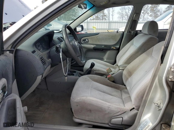 2003 Mazda Protege DX with VIN JM1BJ225131212091, listed as a Copart auction lot 82326154 with 171,184 mi miles and Salvage Title. Bid and sale history available at carsss.com. Image 7.