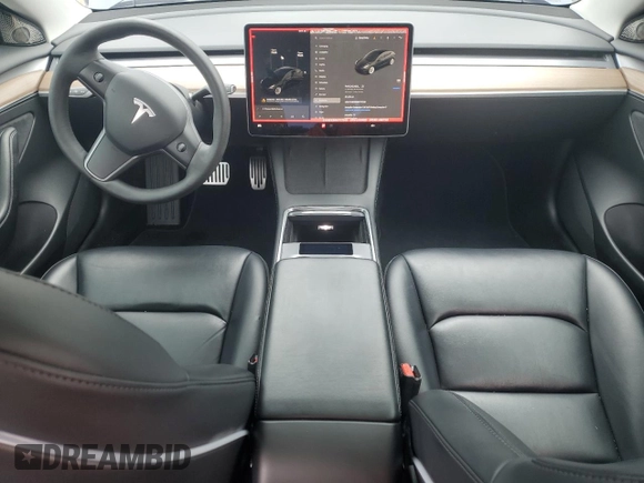 2022 Tesla Model 3 Long Range with VIN 5YJ3E1EB9NF117339, listed as a Copart auction lot 55659415 with 87,479 mi miles and Salvage Title. Bid and sale history available at DreamBid. Image 8.