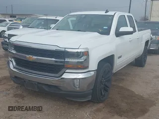 2018 Chevrolet Silverado 1500 LT with VIN 1GCRCREC4JZ224584, listed as a IAAI auction lot 41552287 with 137,026 mi miles and . Bid and sale history available at DreamBid. Image 2.