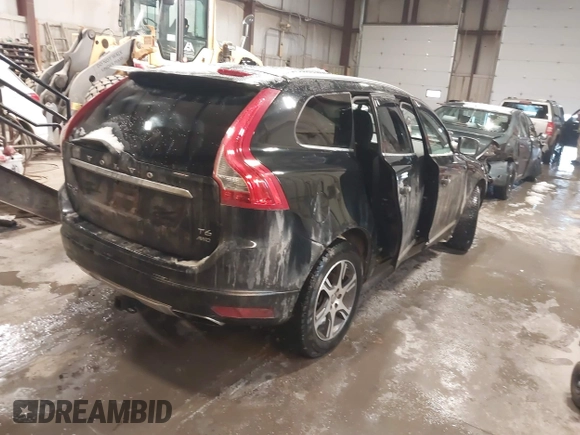 2014 Volvo XC60 R-Design Premier Plus with VIN YV4902DZ7E2537839, listed as a IAAI auction lot 41570128 with 8,858 mi miles and . Bid and sale history available at DreamBid. Image 4.