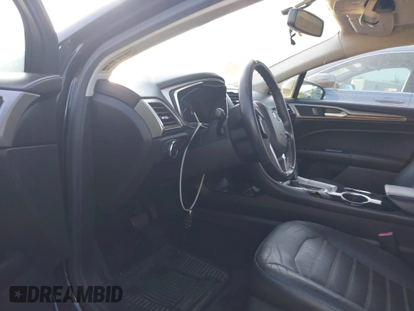 2013 Ford Fusion SE Hybrid с VIN 3FA6P0LU3DR351906, выставлен на аукционе IAAI как лот 42841416 с пробегом 243 206 миль миль и . История ставок и продаж доступна на DreamBid. Изображение 5.