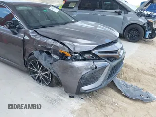 2022 Toyota Camry SE with VIN 4T1T11AK6NU639527, listed as a IAAI auction lot 42092828 with 65,420 mi miles and . Bid and sale history available at DreamBid. Image 6.