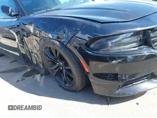 2016 Dodge Charger SXT with VIN 2C3CDXHG6GH146764, listed as a IAAI auction lot 42020618 with 154,693 mi miles and . Bid and sale history available at carsss.com. Image 21.