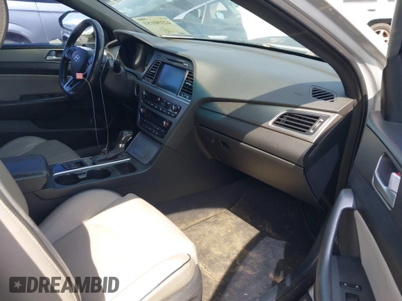 2015 Hyundai Sonata Sport with VIN 5NPE34AB0FH084580, listed as a IAAI auction lot 42150153 with 159,633 mi miles and . Bid and sale history available at carsss.com. Image 5.
