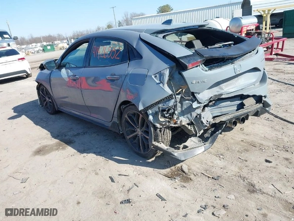 2021 Honda Civic Hatchback Sport Touring with VIN SHHFK7H91MU409114, listed as a IAAI auction lot 41426552 with 131,037 mi miles. Bid and sale history available at carsss.com. Image 3.