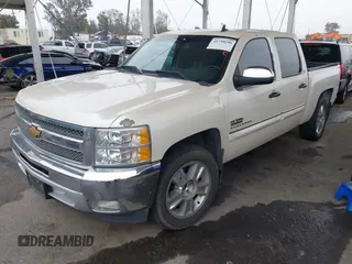 2013 Chevrolet Silverado 1500 LT with VIN 3GCPCSE06DG187949, listed as a IAAI auction lot 41799296 with 169,919 mi miles and . Bid and sale history available at DreamBid. Image 2.