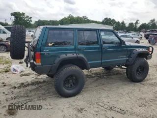 1997 Jeep Cherokee SE with VIN 1J4FJ28S2VL553709, listed as a Copart auction lot 63340974 with 154,029 mi miles and Clean Title. Bid and sale history available at carsss.com. Image 3.