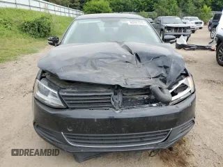 2014 Volkswagen Jetta SE z VIN 3VWD07AJ7EM220416, wystawiony jako Copart lot #60397265 z przebiegiem 184 854 mil mil oraz Czysty tytuł • Clean title. Historia ofert i sprzedaży dostępna na DreamBid. Obrazek 5.