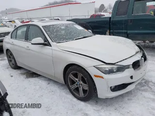 2014 BMW 3 Series 328i with VIN WBA3C1C51EK106435, listed as a IAAI auction lot 41202983 with 142,135 mi miles. Bid and sale history available at carsss.com. Image 1.