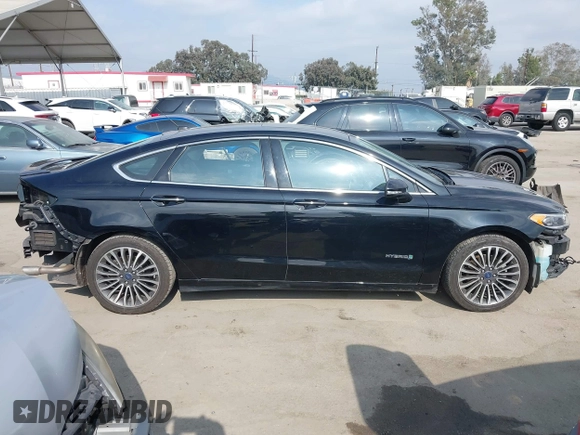 2018 Ford Fusion Titanium with VIN 3FA6P0RU6JR115236, listed as a IAAI auction lot 42111343 with 106,858 mi miles and . Bid and sale history available at DreamBid. Image 14.
