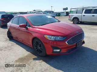 2020 Ford Fusion SE z VIN 3FA6P0HD1LR236440, wystawiony jako IAAI lot #41977279 z przebiegiem 51 228 mil mil oraz . Historia ofert i sprzedaży dostępna na DreamBid. Obrazek 1.
