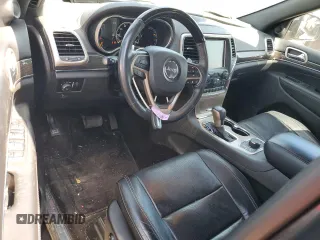 2017 Jeep Grand Cherokee Overland with VIN 1C4RJFCGXHC941983, listed as a Copart auction lot 52008825 with 65,776 mi miles and Salvage Title. Bid and sale history available at carsss.com. Image 8.
