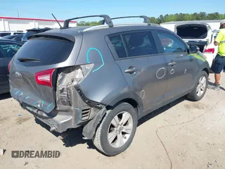 2013 Kia Sportage LX with VIN KNDPB3A21D7486860, listed as a IAAI auction lot 42049450 with 177,059 mi miles and . Bid and sale history available at DreamBid. Image 4.