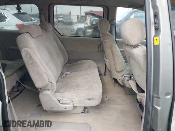 2005 Kia Sedona LX with VIN KNDUP132656734193, listed as a IAAI auction lot 41892342 with 91,768 mi miles. Bid and sale history available at carsss.com. Image 8.