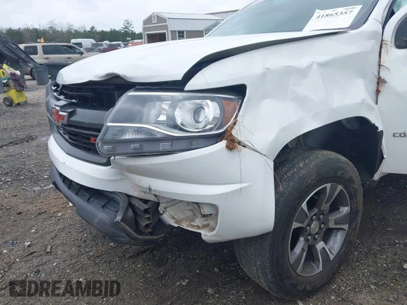 2020 Chevrolet Colorado 4WD Z71 with VIN 1GCGTDEN6L1228309, listed as a IAAI auction lot 41865357 with 100,560 mi miles and . Bid and sale history available at DreamBid. Image 6.