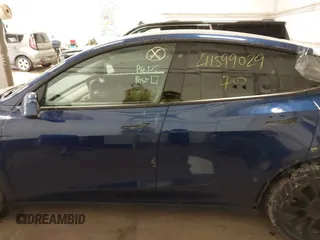 2021 Tesla Model Y Long Range with VIN 5YJYGDEE2MF185945, listed as a IAAI auction lot 41599029 with 53,815 mi miles and . Bid and sale history available at DreamBid. Image 15.