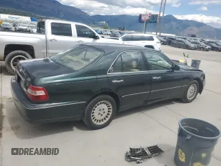 1999 Infiniti Q45 z VIN JNKBY31A6XM600579, wystawiony jako Copart lot #57683075 z przebiegiem 215 415 mil mil oraz Szkoda całkowita • Salvage title. Historia ofert i sprzedaży dostępna na DreamBid. Obrazek 3.