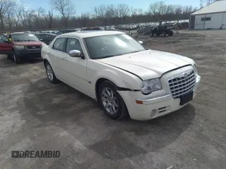 2005 Chrysler 300 with VIN 2C3JA63H65H144648, listed as a IAAI auction lot 41762730 with 125,757 mi miles. Bid and sale history available at carsss.com. Image 1.