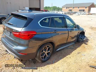 2016 BMW X1 xDrive28i with VIN WBXHT3C31G5E47828, listed as a IAAI auction lot 42592338 with 91,927 mi miles and . Bid and sale history available at DreamBid. Image 4.
