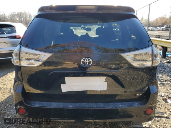 2013 Toyota Sienna SE с VIN 5TDXK3DC9DS390825, выставлен на аукционе Copart как лот 82363794 с пробегом 244 673 миль миль и Списание • Salvage title. История ставок и продаж доступна на DreamBid. Изображение 6.