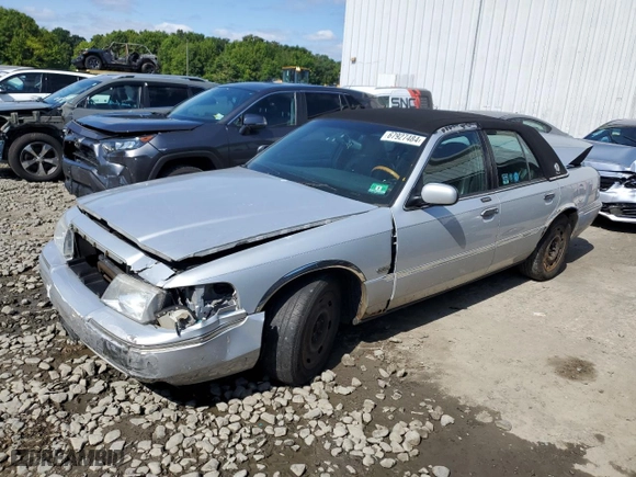 2003 Mercury Grand Marquis LS Premium with VIN 2MEFM75W03X650715, listed as a Copart auction lot 67927484 with 266,869 mi miles and Salvage Title. Bid and sale history available at carsss.com. Image 1.