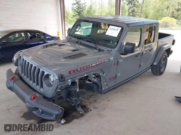 2022 Jeep Gladiator Rubicon with VIN 1C6JJTBG6NL166081, listed as a IAAI auction lot 42204431 with 40,568 mi miles and . Bid and sale history available at DreamBid. Image 18.