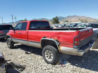 1999 Dodge Ram 2500 with VIN 1B7KF2366XJ519447, listed as a Copart auction lot 68026964 with 318,019 mi miles and Salvage Title. Bid and sale history available at carsss.com. Image 2.