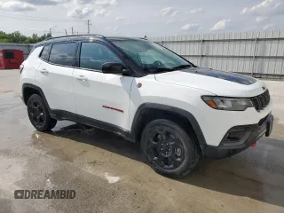 2023 Jeep Compass Trailhawk with VIN 3C4NJDDN5PT567737, listed as a Copart auction lot 61824665 with 43,843 mi miles and Clean title. Bid and sale history available at DreamBid. Image 4.