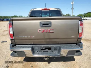 2017 GMC Canyon 2WD SLT z VIN 1GTG5DEN2H1148667, wystawiony jako Copart lot #54824735 z przebiegiem 36 861 mil mil oraz Szkody całkowita. Historia ofert i sprzedaży dostępna na DreamBid. Obrazek 6.