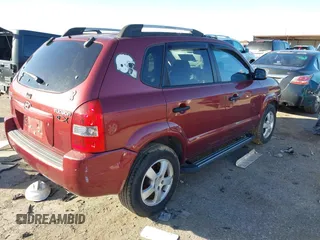 2005 Hyundai Tucson GL with VIN KM8JM12B75U108866, listed as a IAAI auction lot 41218960 with 111,319 mi miles. Bid and sale history available at carsss.com. Image 4.